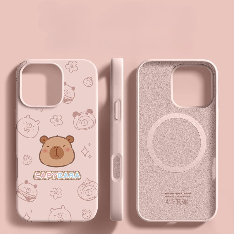 Beige iPhone 16 Pro Max case featuring a capybara cartoon design with flowers and the word "CAPYBARA" in colorful font. Displayed from the back, side, and interior views next to each other, this Cute Capybara Silicone Protective Cover combines style and durability with its shockproof triple-layer design and anti-fingerprint coating.