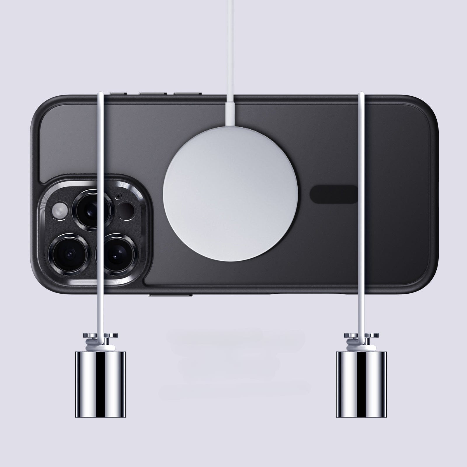 A black smartphone with three rear cameras is attached to a charging cable and is suspended by two metal weights, each connected to the cable, all while snugly fitted in a Durable MagSafe iPhone 16 Pro Max Case made of TPU+PC material with a shockproof air cushion and camera protection.