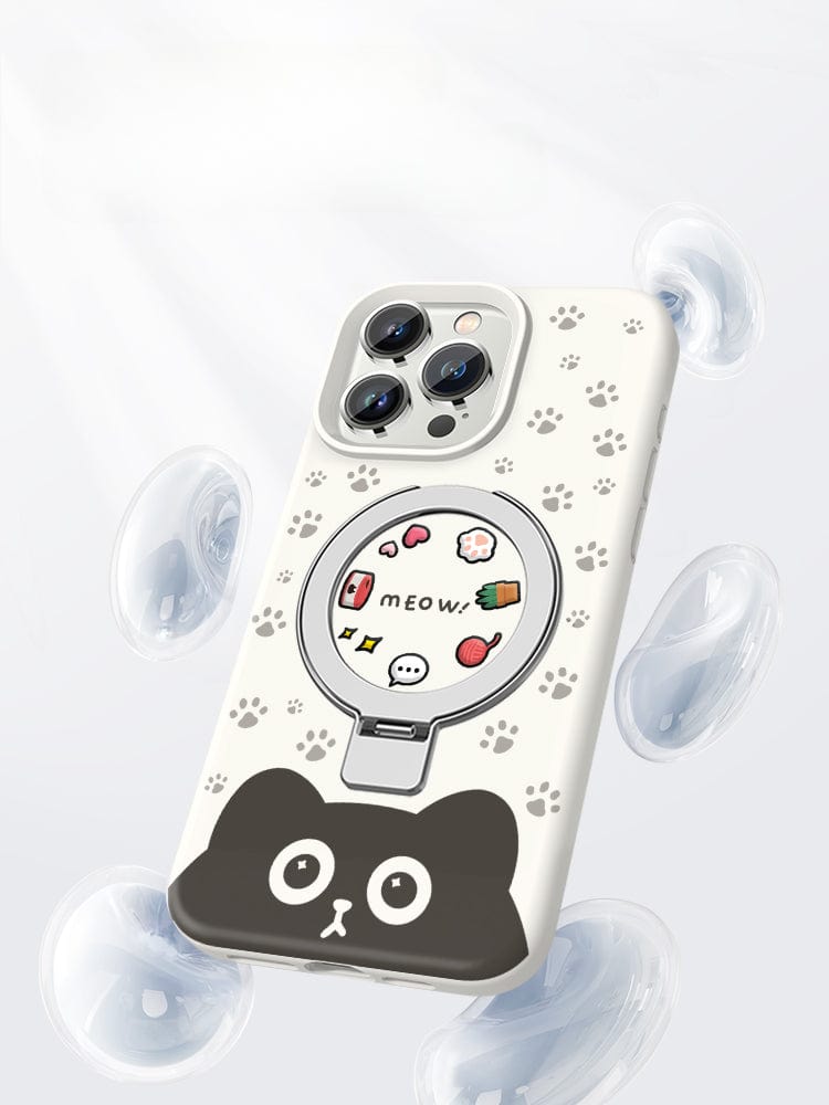 The iPhone 16 Pro Max MagSafe Liquid Silicone Case - Cute Cat Paw Design is a white smartphone case decorated with small paw prints, a cat face at the bottom, and various icons within a circular area that includes the text "meow." The background features floating transparent bubbles. Ensure it's MagSafe compatible with an optional magnetic kickstand for easy viewing.