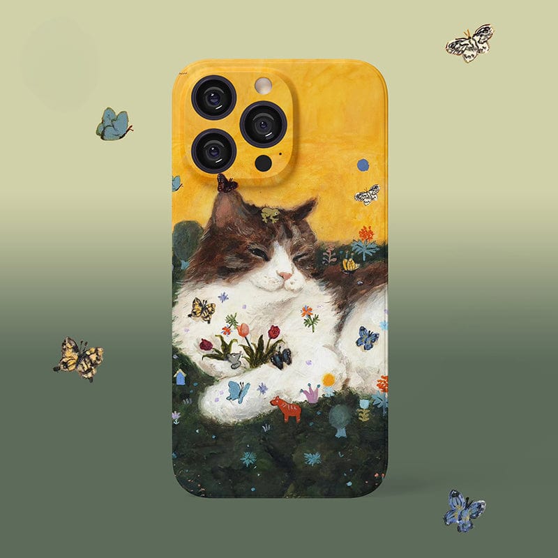 The Whimsical Cat Garden iPhone 16 Pro Max Case showcases an illustrated cat lounging among flowers and butterflies, with a gradient background transitioning from yellow to green that complements the nature-inspired design. The case also features several floating butterflies, adding to its artistic and playful appeal.