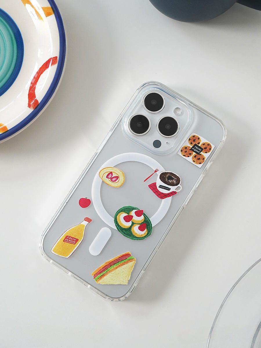 The Brunch Time MagSafe iPhone 16 Pro Max Case showcases a lively design adorned with cute 3D food stickers, including a sandwich, bottle of mustard, plate of avocado toast, cookie, donut, bowl of ramen, and cup of coffee. This fun all-inclusive protective cover rests on a white surface next to a colorful plate.