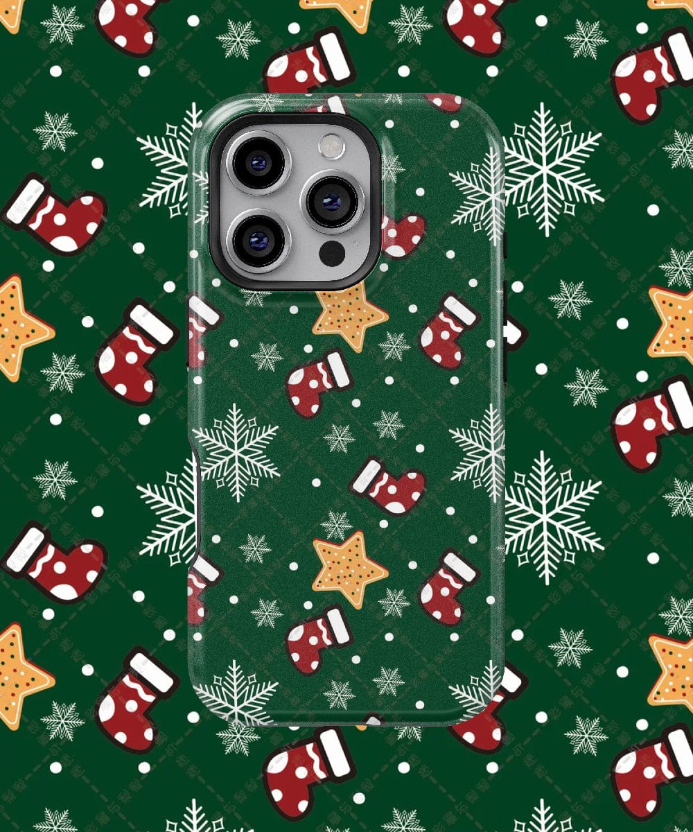 The Festive Stocking iPhone 16 Pro Max Case features MagSafe compatibility and holiday-themed designs, including snowflakes, festive stockings, and stars, all elegantly presented on a matching green backdrop.