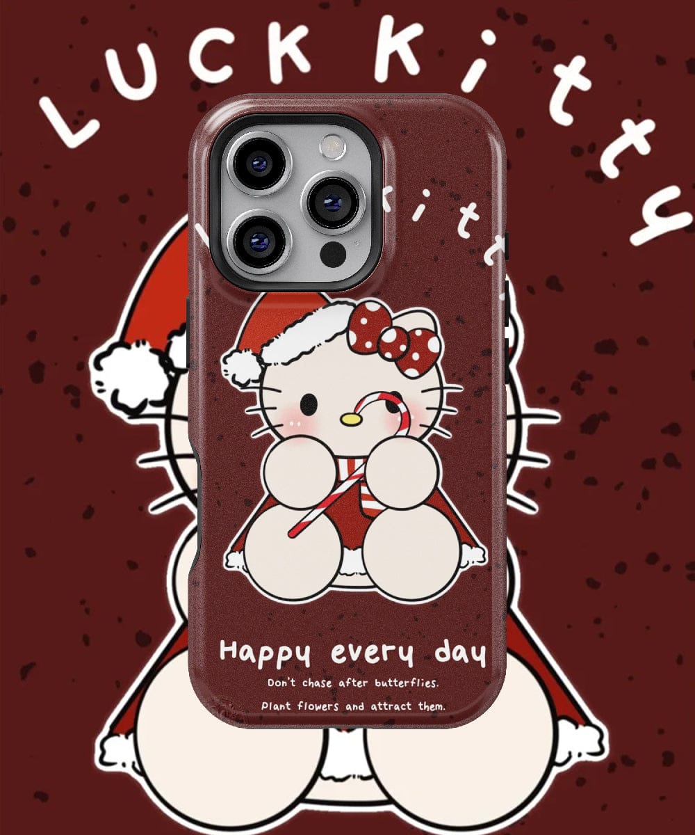 Presenting the Christmas Lucky Kitty iPhone 16 Pro Max Case – Festive Cute Cat Design, Holiday Charm, MagSafe Compatible! This phone case showcases a delightful cartoon cat wearing a Santa hat and holding a candy cane, adorned with "Happy every day" and motivational phrases on a vibrant red background filled with playful text.