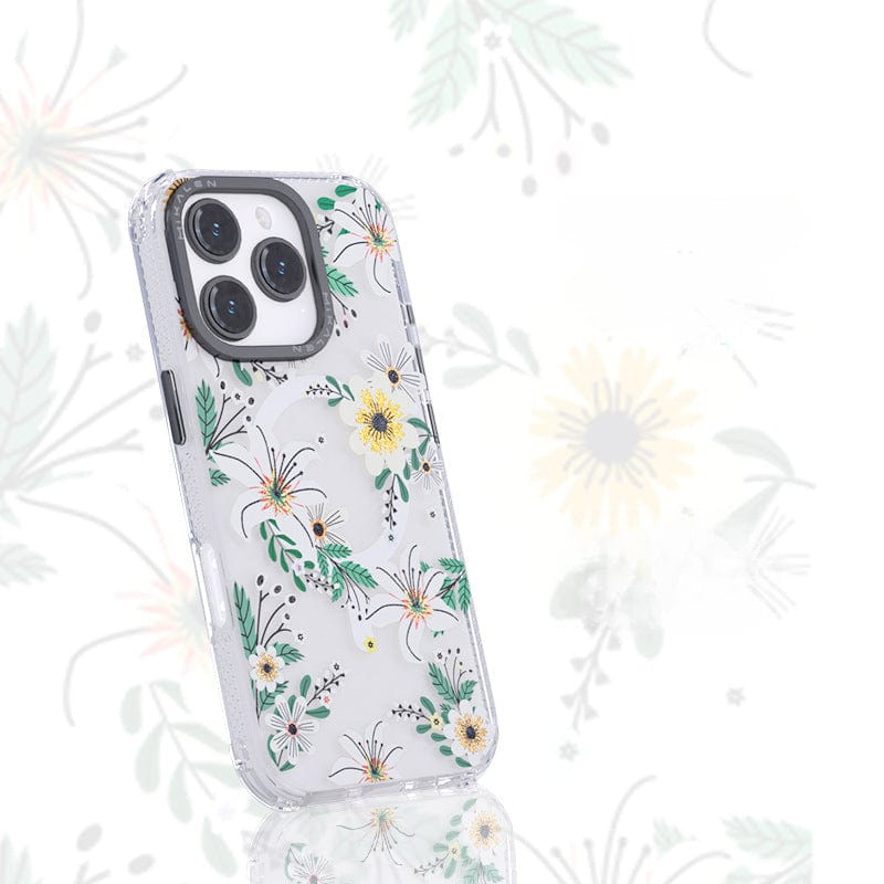 A Floral MagSafe iPhone 16 Pro Max Case, featuring a shockproof clear cover with a 3D flower design in green and yellow hues, placed upright against a matching floral background. The "Lily" colored case is TPU + PC protective shell is MagSafe compatible for easy charging.