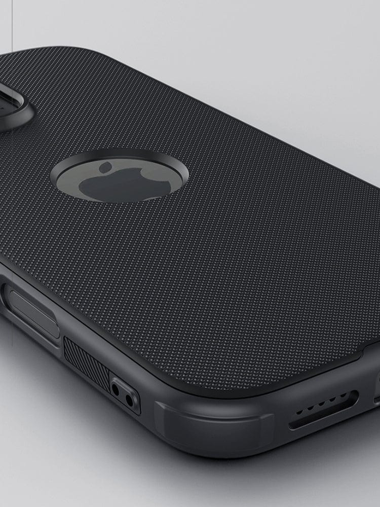 Close-up view of the black textured iPhone 16 Pro Max Protective Case, featuring dual-layer protection and a circular cutout that reveals the Apple logo on the back.