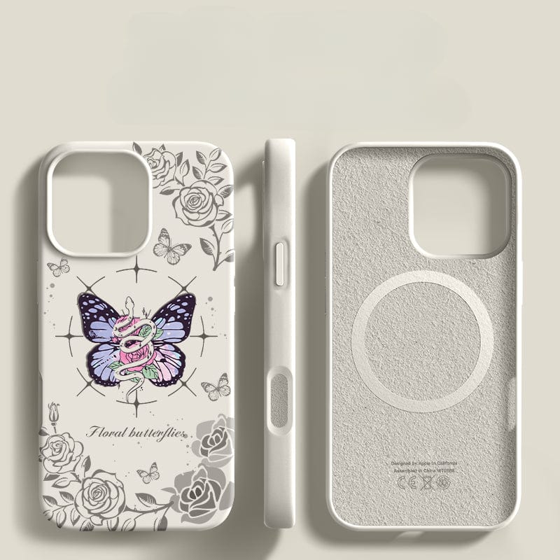 Two white iPhone 16 Pro Max cases are displayed. The left case, titled "iPhone 16 Pro Max Floral Butterfly Case," showcases a floral butterfly design. Both cases boast MagSafe compatibility with a circular magnet on the back and feature a triple-layer shockproof structure for superior protection.