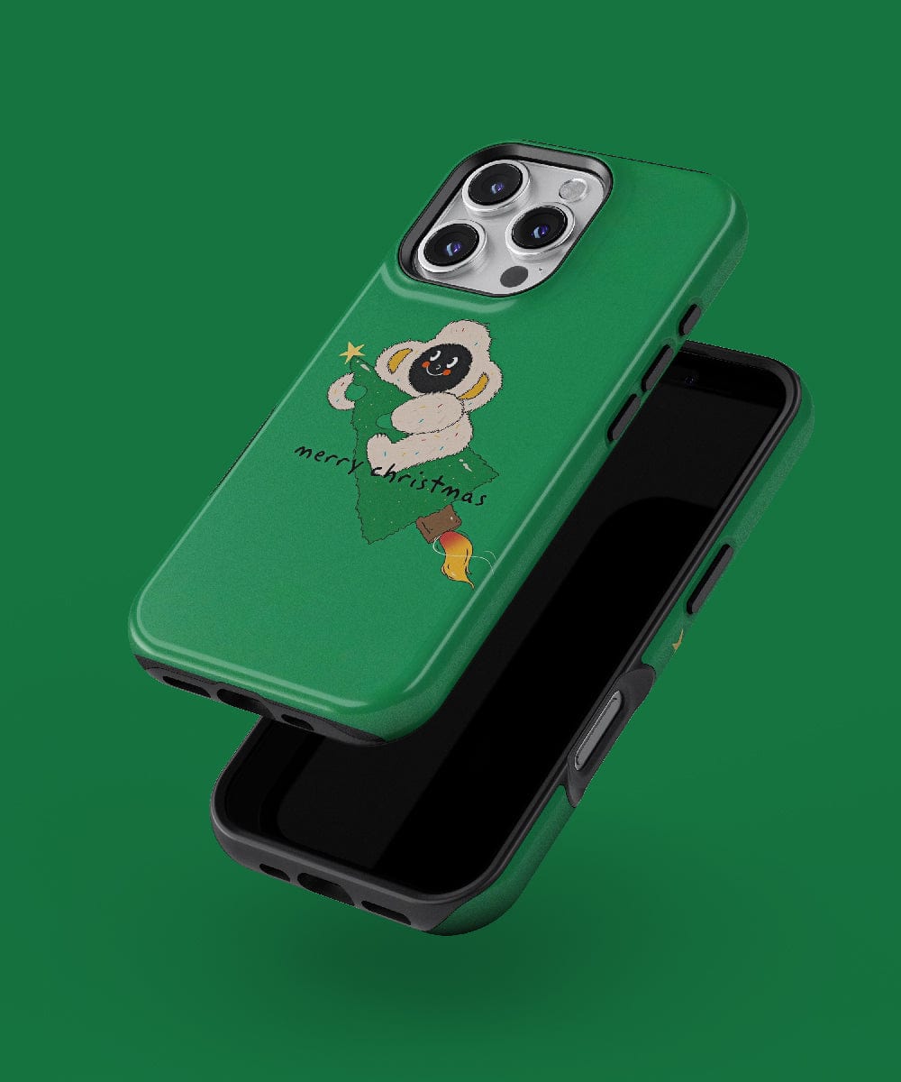 Two green "Merry Christmas Monkey" iPhone 16 Pro Max cases, designed with a festive monkey theme and MagSafe compatibility. Each case is adorned with cartoon monkeys and the text "Merry Christmas" on a solid green background for a holiday touch.