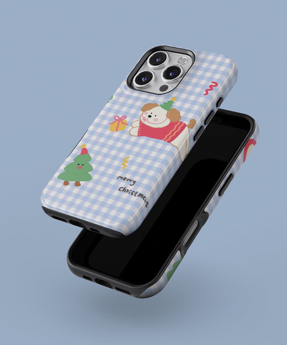 Two MagSafe-Compatible iPhone 16 Pro Max cases feature a festive holiday puppy design with a "merry Christmas" message on a blue checkered background.