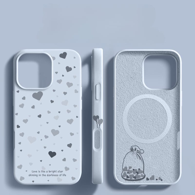 Gray iPhone 16 Pro Max case with heart patterns and a motivational quote, "Love is like a bright star shining in the darkness of life." Made from dust-resistant liquid silicone, this soft protective cover features a visual of a bag filled with hearts and includes shockproof design and an anti-fingerprint coating.