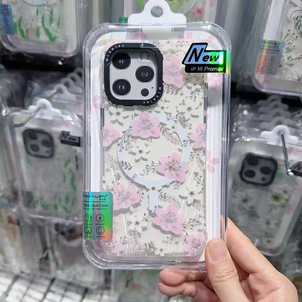 Clear plastic phone case with a 3D floral design for an iPhone 16 Pro Max, featuring shockproof protection, displayed in packaging.