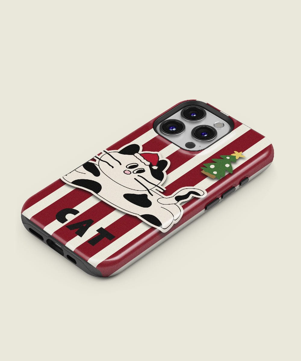 This playful holiday cat design phone case for the iPhone 16 Pro Max features red stripes, a cartoon cat wearing a Santa hat, and a Christmas tree graphic. The word "CAT" is printed at the bottom, and it offers MagSafe compatibility for added convenience.