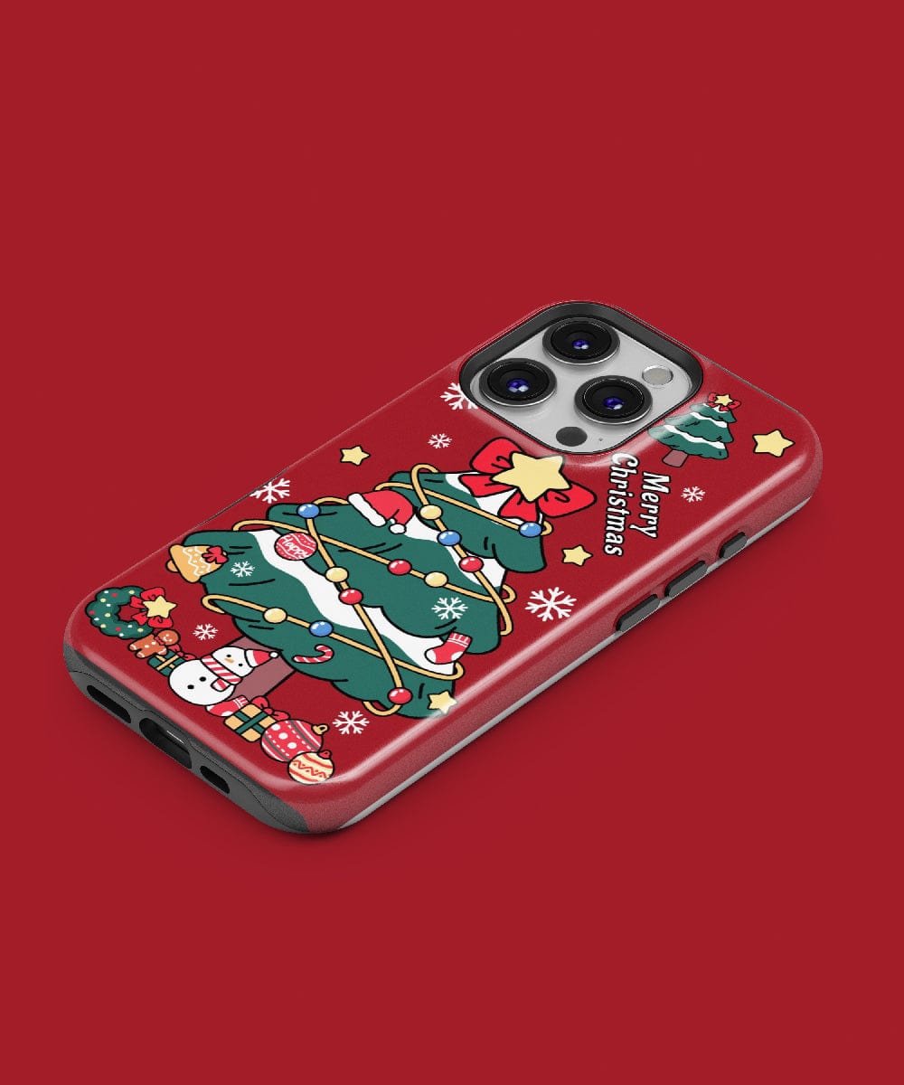 The Christmas Tree iPhone 16 Pro Max Case – Festive Holiday Design features a beautifully decorated tree, cute ornaments, and snowflakes against a vibrant red background. Offering dual-layer protection and MagSafe compatibility, it's the perfect blend of style and functionality for sharing holiday spirit.