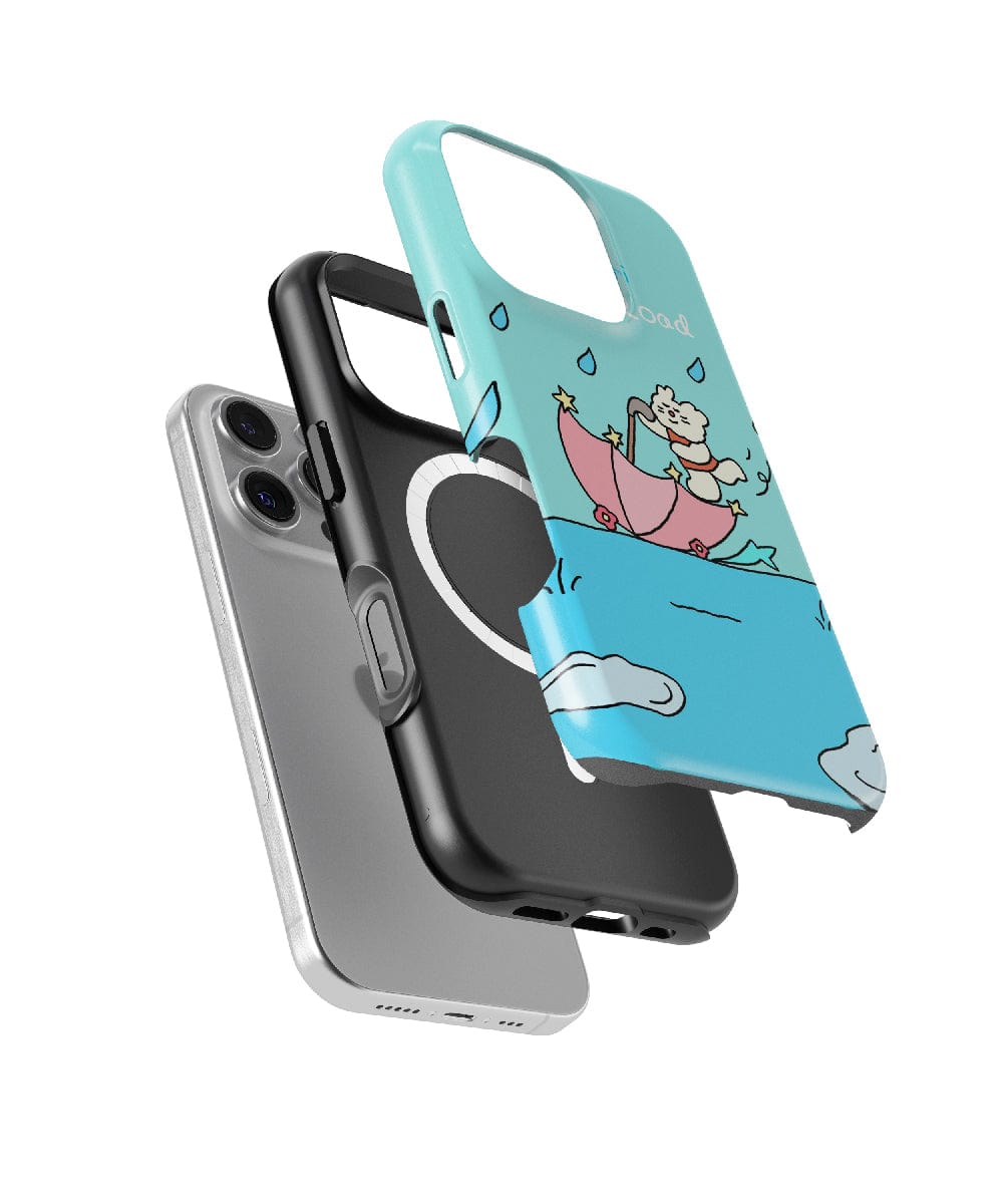 Three smartphone cases, one featuring a cute bear with an umbrella design, one adorned with a heart, and a plain MagSafe compatible case, are shown floating above a smartphone. Enjoy both style and shockproof protection for your device with the Cute Bear with Umbrella iPhone 16 Pro Max Case – MagSafe Compatible, Slim Fit, Shockproof PC + Silicone Design.