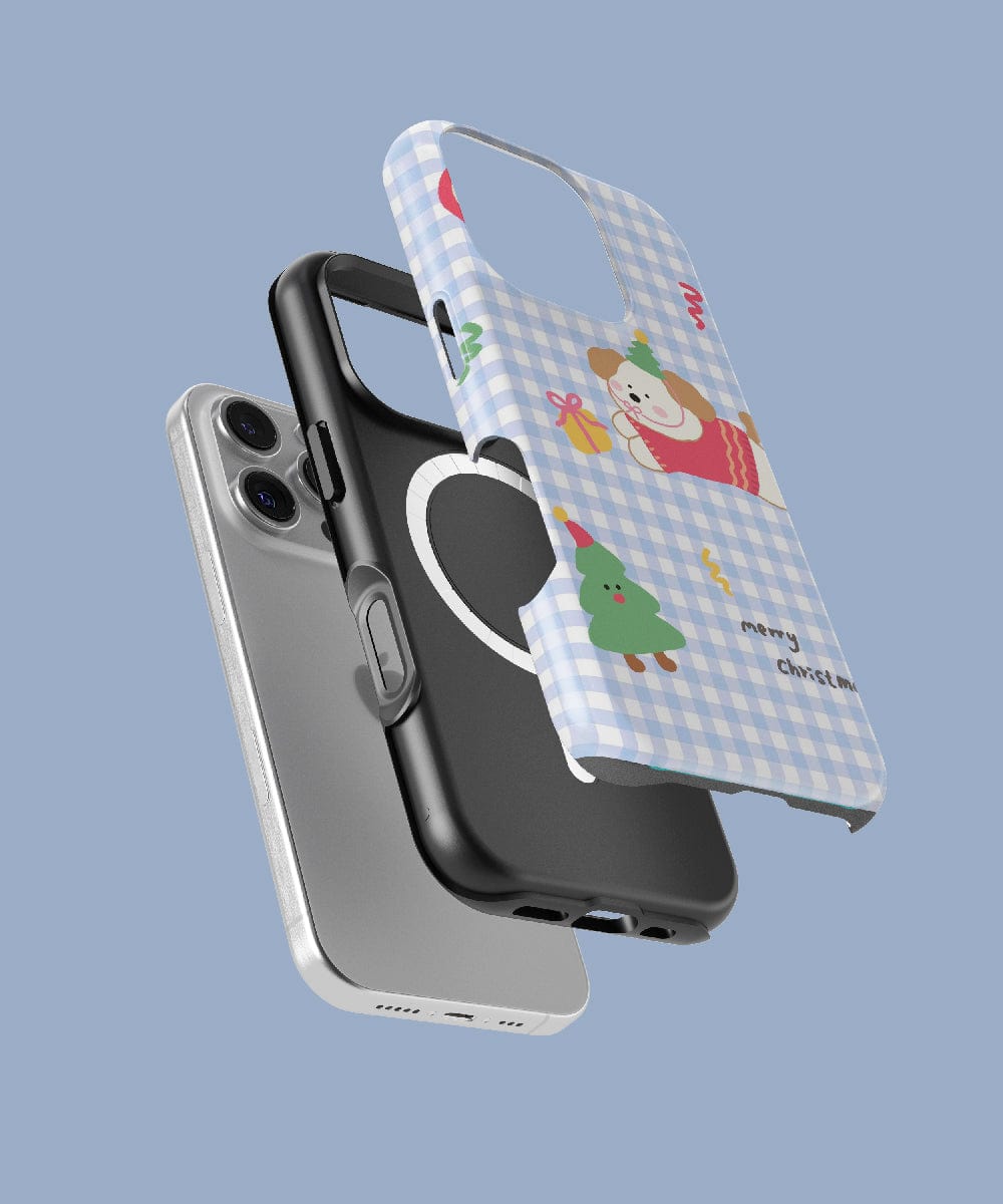 Displayed are three iPhone 16 Pro Max cases: a clear case that's MagSafe compatible, a solid black option, and the Gingham Christmas Puppy case featuring a cute holiday dog design with a festive pattern, also MagSafe compatible.